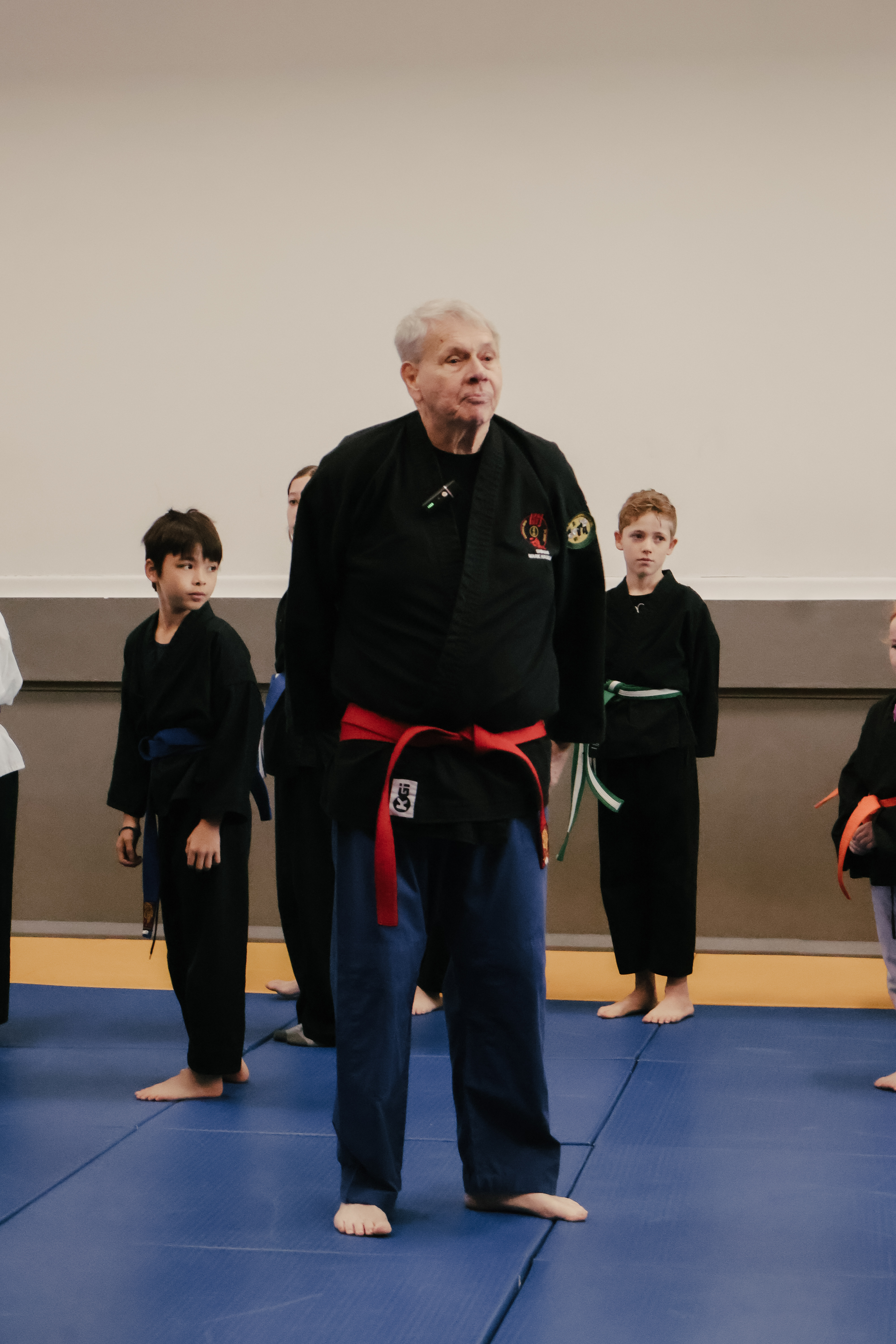 Shihan Mark teaching a young student a Ju Jitsu technique